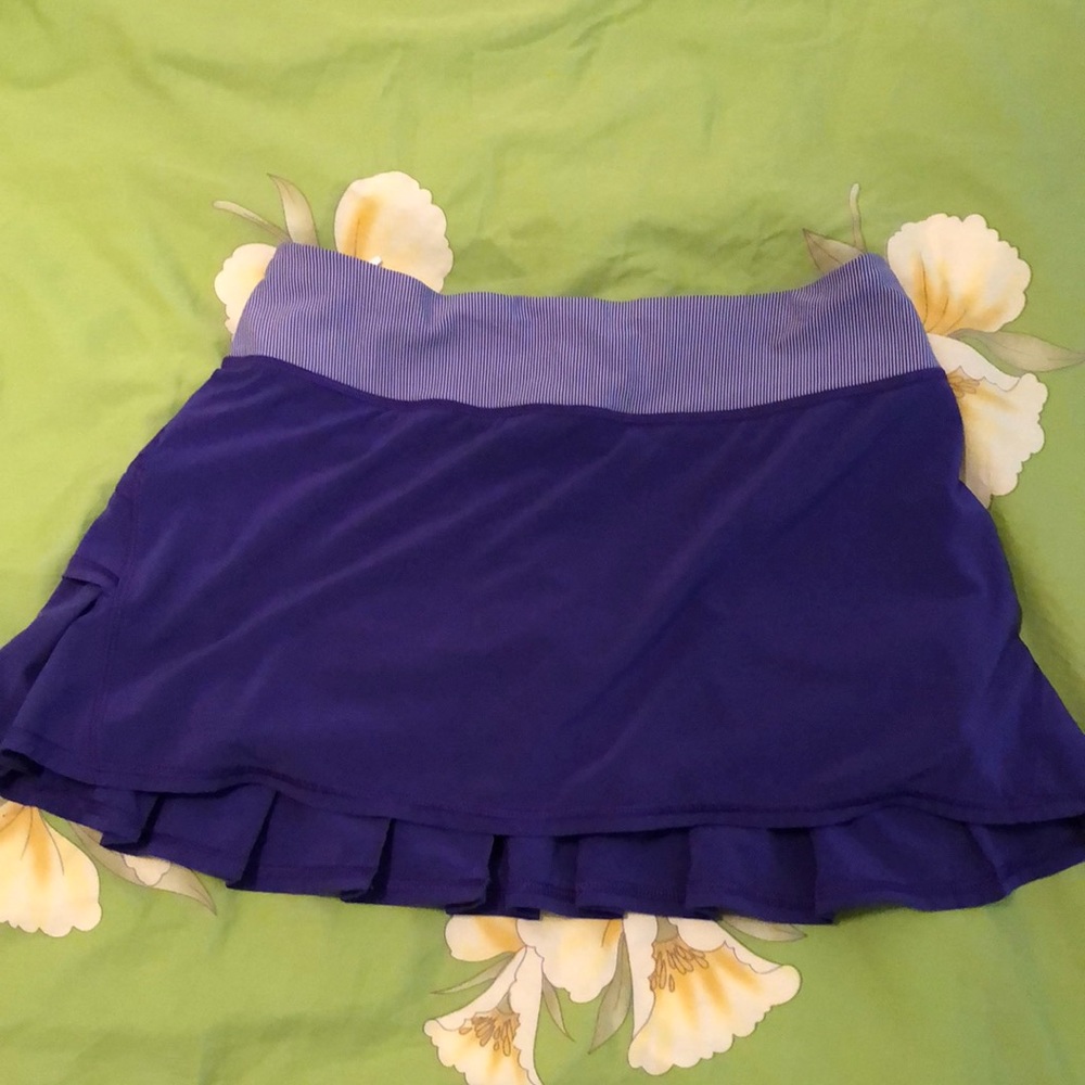 Lululemon skirt/ tennis running shorts.